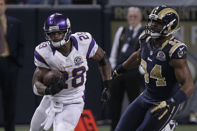 Minnesota Vikings running back Adrian Peterson (28) runs with the ball during the fourth quarter of an NFL football game against the St. Louis Rams Sunday, Dec. 16, 2012, in St. Louis. (AP Photo/Seth Perlman)