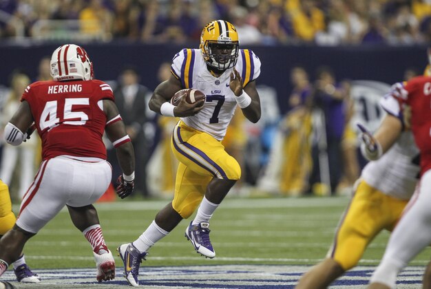 Aug 30, 2014; Houston, TX, USA; LSU Tigers running back Leonard Fournette (7) rushes with the ball during the first quarter against the Wisconsin Badgers at NRG Stadium. Mandatory Credit: Troy Taormina-USA TODAY Sports