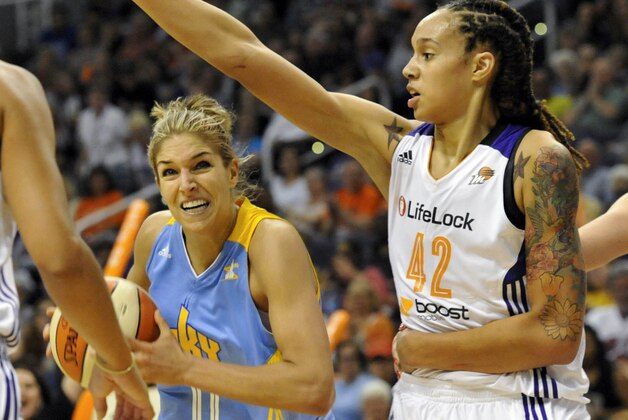 May 27, 2013; Phoenix, AZ, USA; Chicago Sky guard/forward Elena Delle Donne (11) drives to the basket as Phoenix Mercury center Brittney Griner (42) defends during the second half at US Airways Center. The Chicago Sky defeated the Phoenix Mercury 102-80. Mandatory Credit: Casey Sapio-USA TODAY Sports