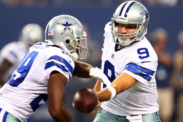 ARLINGTON, TX - AUGUST 16:  Tony Romo #9 of the Dallas Cowboys hands off to DeMarco Murray #29 against the Baltimore Ravens in the first half of the preseason game at AT&T Stadium on August 16, 2014 in Arlington, Texas.  (Photo by Ronald Martinez/Getty Images)