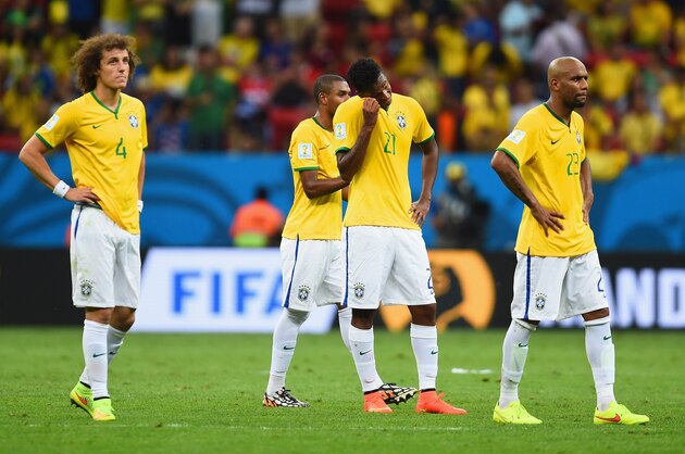 BRASILIA, BRAZIL - JULY 12: (L-R) David Luiz, Fernandinho, Jo and Maicon of Brazil look on after being defeated by the Netherlands 3-0 during the 2014 FIFA World Cup Brazil Third Place Playoff match between Brazil and the Netherlands at Estadio Nacional on July 12, 2014 in Brasilia, Brazil.  (Photo by Jamie McDonald/Getty Images)