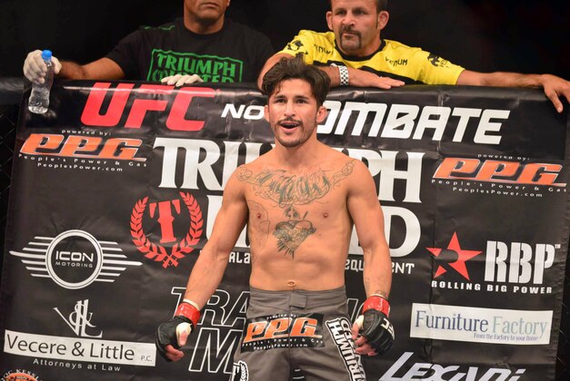 Aug 3, 2013; Rio De Janeiro, Brazil; Ian McCall (red gloves) in his corner during his fight against Iliarde Santos during UFC 163 at HSBC Arena. Mandatory Credit: Jason Silva-USA TODAY Sports