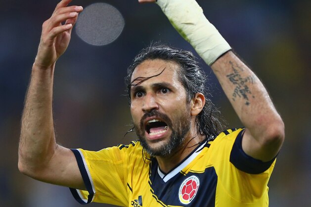 RIO DE JANEIRO, BRAZIL - JUNE 28:  Mario Yepes of Colombia reacts during the 2014 FIFA World Cup Brazil round of 16 match between Colombia and Uruguay at Maracana on June 28, 2014 in Rio de Janeiro, Brazil.  (Photo by Jamie Squire/Getty Images)
