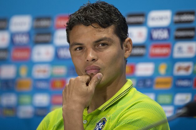 Brazil's Thiago Silva looks on during a news conference, the day before the World Cup semifinal soccer match between Brazil and Germany, at the Mineirao Stadium in Belo Horizonte, Brazil, Monday, July 7, 2014. (AP Photo/Andre Penner)