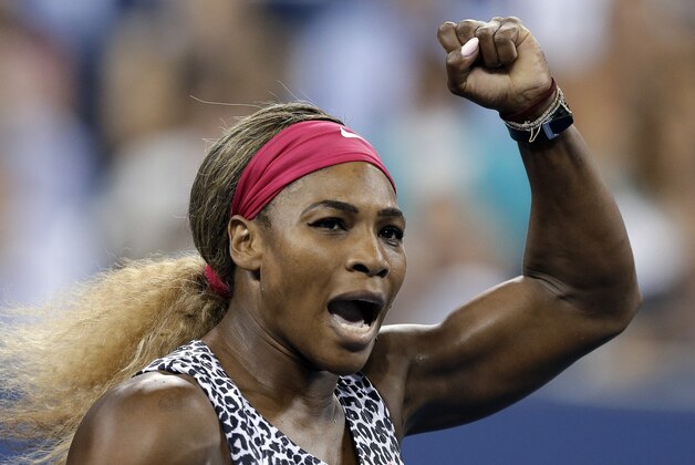 Serena Williams, of the United States, gestures after defeating Flavia Pennetta, of Italy, 6-3, 6-2 in the quarterfinals of the U.S. Open tennis tournament Wednesday, Sept. 3, 2014, in New York. (AP Photo/Darron Cummings)