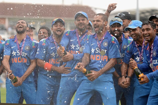 LEEDS, ENGLAND - SEPTEMBER 05:  India celebrate after winning the Royal London One Day International series between England and India at Headingley on September 5, 2014 in Leeds, England.  (Photo by Gareth Copley/Getty Images)