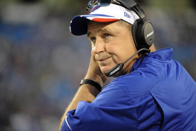 Buffalo Bills head coach Doug Marrone looks on during the first half of a preseason NFL football game against the Detroit Lions, Thursday, Aug. 28, 2014, in Orchard Park, N.Y. (AP Photo/Gary Wiepert)