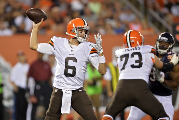 Cleveland Browns' Brian Hoyer passes (6) against the Chicago Bears in the first quarter of a preseason NFL football game Thursday, Aug. 28, 2014, in Cleveland. (AP Photo/David Richard)