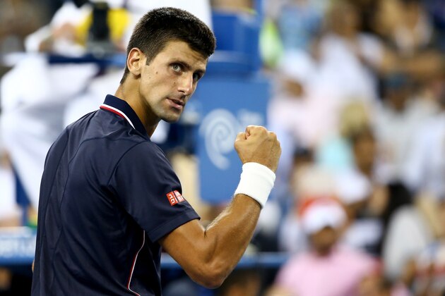 NEW YORK, NY - SEPTEMBER 03:  Novak Djokovic of Serbia celebrates after defeating Andy Murray of Great Britain in their men's singles quarterfinal match on Day Ten of the 2014 US Open at the USTA Billie Jean King National Tennis Center on September 3, 2014 in the Flushing neighborhood of the Queens borough of New York City. Djokovic defeated Murray 7-6, 6-7, 6-2, 6-4.  (Photo by Streeter Lecka/Getty Images)