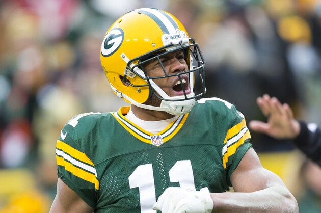 Nov 24, 2013; Green Bay, WI, USA; Green Bay Packers wide receiver Jarrett Boykin (11) celebrates a catch during overtime against the Minnesota Vikings at Lambeau Field.  The Vikings and Packers tied 26-26.  Mandatory Credit: Jeff Hanisch-USA TODAY Sports