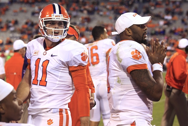 Clemson quarterback Chad Kelly (11)and Tajh Boyd during the second half of an NCAA college football game in Charlottesville, Va., Saturday, Nov. 2, 2013. Clemson won 59-10. (AP Photo/Steve Helber) Clemson quarterback Chad Kelly (11)and Tajh Boyd during the second half of an NCAA college football game in Charlottesville, Va., Saturday, Nov. 2, 2013. Clemson won 59-10. (AP Photo/Steve Helber)