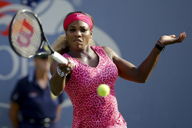 Serena Williams, returns a shot against Ekaterina Makarova, of Russia, during the semifinals of the 2014 U.S. Open tennis tournament, Friday, Sept. 5, 2014, in New York. (AP Photo/Darron Cummings)