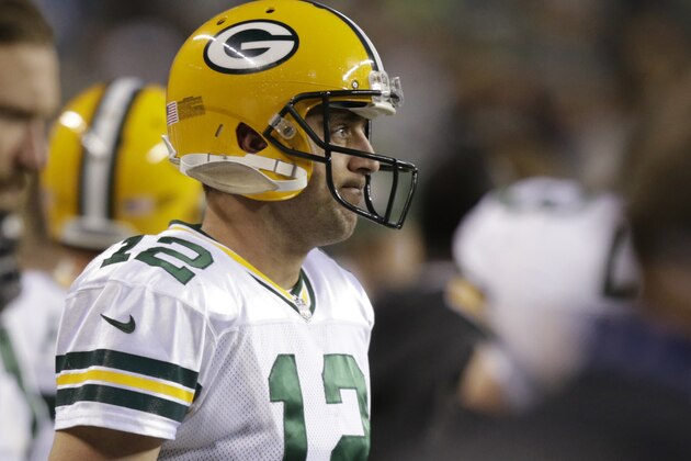 Green Bay Packers quarterback Aaron Rodgers stands on the sideline late in the fourth quarter of an NFL football game against the Seattle Seahawks, Thursday, Sept. 4, 2014, in Seattle. The Seahawks won 36-16. (AP Photo/Stephen Brashear) Green Bay Packers quarterback Aaron Rodgers stands on the sideline late in the fourth quarter of an NFL football game against the Seattle Seahawks, Thursday, Sept. 4, 2014, in Seattle. The Seahawks won 36-16. (AP Photo/Stephen Brashear)