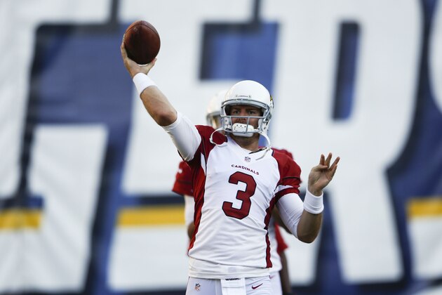 Arizona Cardinals quarterback Carson Palmer throws during warmup before facing the San Diego Chargers in an NFL preseason football game Thursday, Aug. 28, 2014, in San Diego. (AP Photo/Lenny Ignelzi)