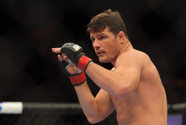 Apr 27, 2013; Newark, NJ, USA; Michael Bisping (red gloves) competes against Alan Belcher (not pictured) during UFC 159 at the Prudential Center. Mandatory Credit: Brad Penner-USA TODAY Sports