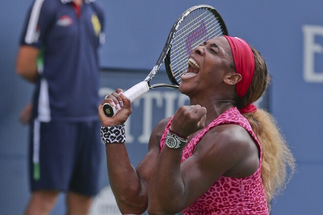 Serena Williams, reacts after defeating Ekaterina Makarova, of Russia, during the semifinals of the 2014 U.S. Open tennis tournament, Friday, Sept. 5, 2014, in New York. (AP Photo/Mike Groll)