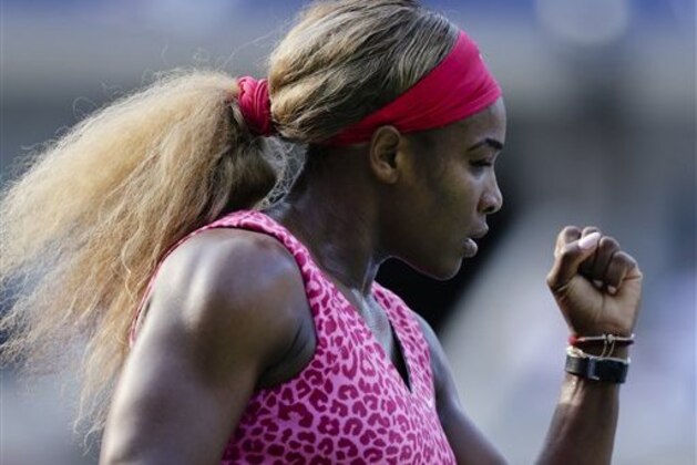 Serena Williams, of the United States, reacts after a shot against Ekaterina Makarova, of Russia, during the semifinals of the 2014 U.S. Open tennis tournament, Friday, Sept. 5, 2014, in New York. (AP Photo/Charles Krupa)