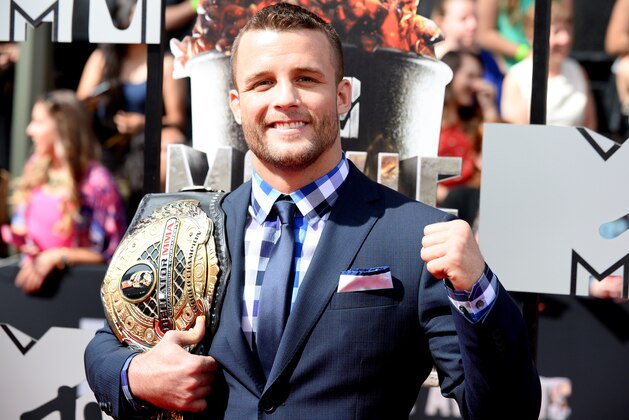 Pat Curran arrives at the MTV Movie Awards on Sunday, April 13, 2014, at Nokia Theatre in Los Angeles. (Photo by Jordan Strauss/Invision/AP)