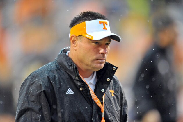 Aug 31, 2014; Knoxville, TN, USA; Tennessee Volunteers head coach Butch Jones leaves the field after warm ups prior to the game against the Utah State Aggies at Neyland Stadium. Mandatory Credit: Jim Brown-USA TODAY Sports