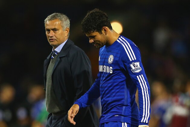 BURNLEY, ENGLAND - AUGUST 18:  Manager Jose Mourinho of Chelsea speaks to Diego Costa of Chelsea after the Barclays Premier League match between Burnley and Chelsea at Turf Moor on August 18, 2014 in Burnley, England.  (Photo by Clive Brunskill/Getty Images)