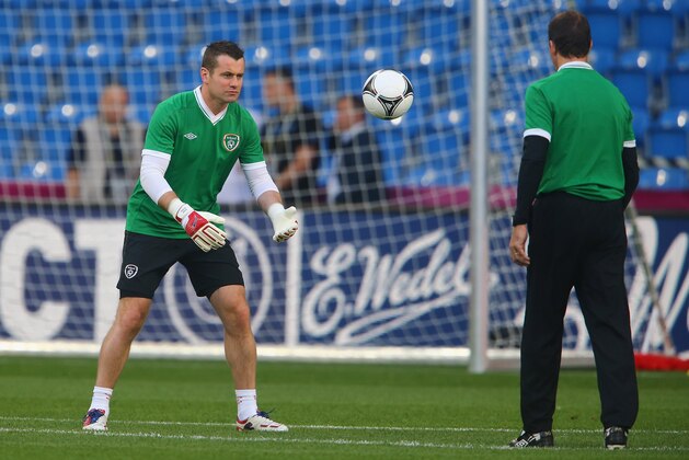 POZNAN, POLAND - JUNE 17: Shay Given of Ireland (L) ctaches a ball during a UEFA EURO 2012 training session at the Municipal Stadium on June 17, 2012 in Poznan, Poland. (Photo by Christof Koepsel/Getty Images)