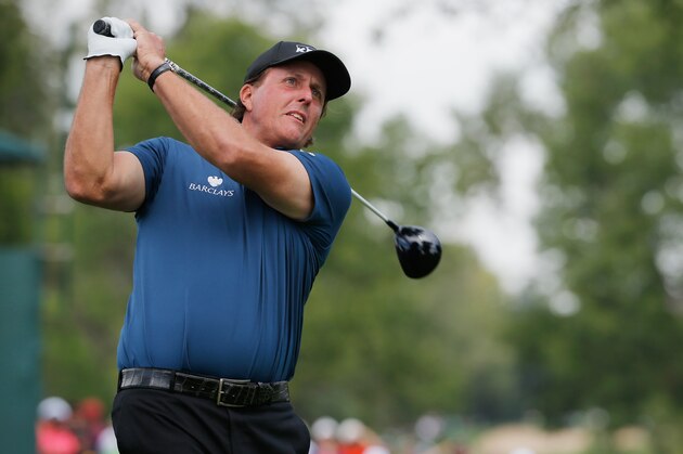 CHERRY HILLS VILLAGE, CO - SEPTEMBER 04:  Phil Mickelson of the United States hits his tee shot on the second hole during the first round of the BMW Championship at the Cherry Hills Country Club on September 4, 2014 in Cherry Hills Village, Colorado.  (Photo by Doug Pensinger/Getty Images)