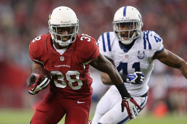 GLENDALE, AZ - NOVEMBER 24:  Running back Andre Ellington #38 of the Arizona Cardinals rushes the football against the Indianapolis Colts during the NFL game at the University of Phoenix Stadium on November 24, 2013 in Glendale, Arizona. The Cardinals defeated the Colts 40-11.  (Photo by Christian Petersen/Getty Images)
