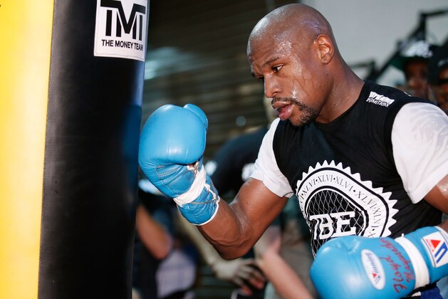 LAS VEGAS, NV - SEPTEMBER 02:  Boxer Floyd Mayweather Jr. works out at the Mayweather Boxing Club on September 2, 2014 in Las Vegas, Nevada. Mayweather Jr. will defend his WBC/WBA welterweight titles against Marcos Maidana on September 13 in Las Vegas.  (Photo by Eric Jamison/Getty Images)