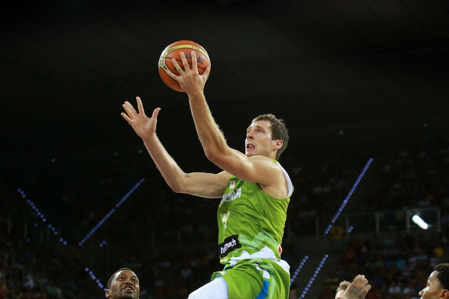 LAS PALMAS, GRAN CANARIA, SPAIN - AUGUST 26: Goran Dragic #11 of the Slovenia Basketball Men's National Team shoots against Rudy Gay #8 of the USA Basketball Men's National Team on August 26, 2014 at Gran Canaria Arena in Las Palmas, Gran Canaria, Spain. NOTE TO USER: User expressly acknowledges and agrees that, by downloading and or using this photograph, user is consenting to the terms and conditions of the Getty Images License Agreement. Mandatory Copyright Notice: Copyright 2014 NBAE (Photo by Joe Murphy/NBAE via Getty Images)