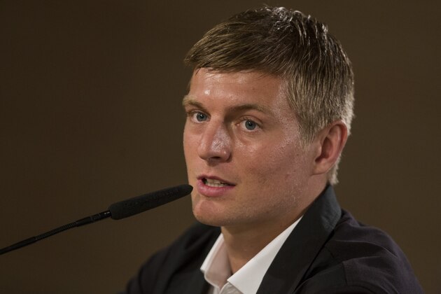 German international soccer player Toni Kroos, listens to a question during his official presentation at the Santiago Bernabeu stadium in Madrid, Spain, Thursday, July 17, 2014, after signing for Real Madrid. (AP Photo/Andres Kudacki)
