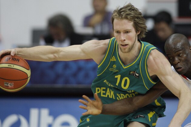 Leonel Paulo, right, from Angola guards David Barlow, left, from Australia during their World Basketball Championship preliminary round match in Kayseri, Turkey, Thursday, Sept. 2, 2010. Australia won the match 76-55. (AP Photo / Petr David Josek)