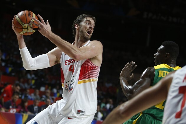 Spain's Paul Gasol passes the ball during the  Basketball World Cup  Round of 16 match between Spain and Senegal in Madrid, Spain, Saturday, Sept. 6, 2014. The 2014 Basketball World Cup competition will take place in various cities in Spain from Aug. 30 through to Sept. 14. (AP Photo/Andres Kudacki)