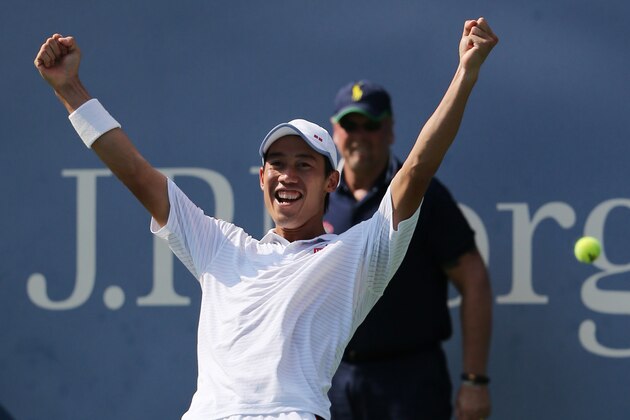 Kei Nishikori, of Japan, reacts after defeating Novak Djokovic, of Serbia, during the semifinals of the 2014 U.S. Open tennis tournament, Saturday, Sept. 6, 2014, in New York. (AP Photo/Mike Groll)