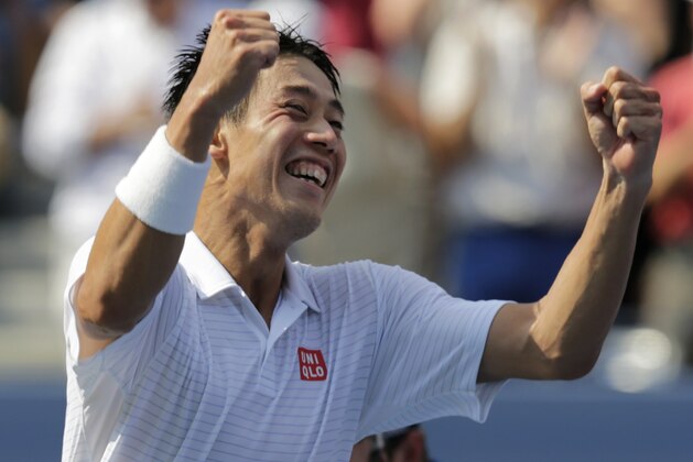 Kei Nishikori, of Japan, reacts after defeating Novak Djokovic, of Serbia, in the semifinals of the 2014 U.S. Open tennis tournament, Saturday, Sept. 6, 2014, in New York. (AP Photo/Charles Krupa)