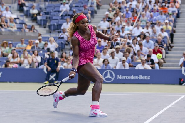 Serena Williams, returns a shot against Ekaterina Makarova, of Russia, during the semifinals of the 2014 U.S. Open tennis tournament, Friday, Sept. 5, 2014, in New York. (AP Photo/Mike Groll)