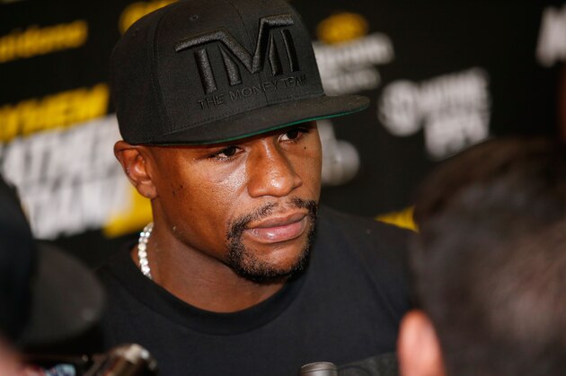 LAS VEGAS, NV - SEPTEMBER 02: Boxer Floyd Mayweather Jr. arrives for a workout at the Mayweather Boxing Club on September 2, 2014 in Las Vegas, Nevada. Mayweather Jr. will defend his WBC/WBA welterweight titles against Marcos Maidana on September 13 in Las Vegas. (Photo by Eric Jamison/Getty Images) LAS VEGAS, NV - SEPTEMBER 02: Boxer Floyd Mayweather Jr. arrives for a workout at the Mayweather Boxing Club on September 2, 2014 in Las Vegas, Nevada. Mayweather Jr. will defend his WBC/WBA welterweight titles against Marcos Maidana on September 13 in Las Vegas. (Photo by Eric Jamison/Getty Images)