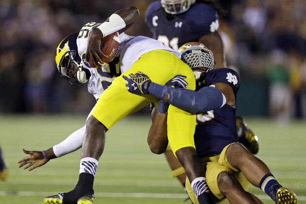 Michigan quarterback Devin Gardner is sacked by Notre Dame defensive lineman Romeo Okwara, right, during the first half of an NCAA college football game in South Bend, Ind., Saturday, Sept. 6, 2014. (AP Photo/Michael Conroy) Michigan quarterback Devin Gardner is sacked by Notre Dame defensive lineman Romeo Okwara, right, during the first half of an NCAA college football game in South Bend, Ind., Saturday, Sept. 6, 2014. (AP Photo/Michael Conroy)