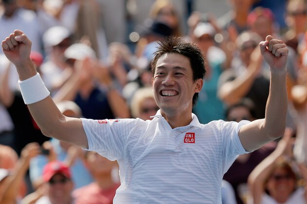 NEW YORK, NY - SEPTEMBER 06:  Kei Nishikori of Japan celebrates after defeating Novak Djokovic of Serbia in their men's singles semifinal match on Day Thirteen of the 2014 US Open at the USTA Billie Jean King National Tennis Center on September 6, 2014 in the Flushing neighborhood of the Queens borough of New York City.  (Photo by Mike Stobe/Getty Images for USTA)