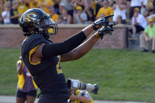 Aug 30, 2014; Columbia, MO, USA; Missouri Tigers wide receiver Bud Sasser (21) celebrates scoring a touchdown against the South Dakota State Jackrabbits during the second half at Faurot Field. Mandatory Credit: Jasen Vinlove-USA TODAY Sports