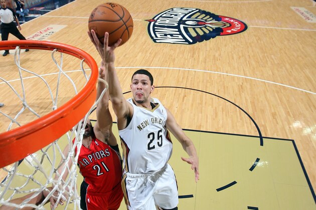 NEW ORLEANS, LA - MARCH 19: Austin Rivers #25 of the New Orleans Pelicans goes up for the layup against the Toronto Raptors during an NBA game on March 19, 2014 at the Smoothie King Center in New Orleans, Louisiana. NOTE TO USER: User expressly acknowledges and agrees that, by downloading and or using this Photograph, user is consenting to the terms and conditions of the Getty Images License Agreement. Mandatory Copyright Notice: Copyright 2014 NBAE (Photo by Layne Murdoch/NBAE via Getty Images)