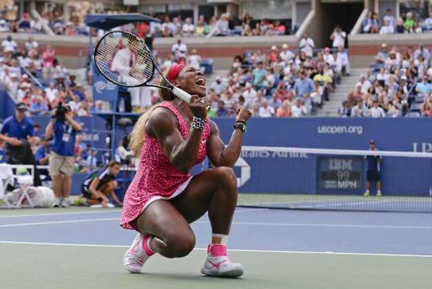 Serena Williams, reacts after defeating Ekaterina Makarova, of Russia,  during the semifinals of the 2014 U.S. Open tennis tournament, Friday, Sept. 5, 2014, in New York. (AP Photo/Charles Krupa)