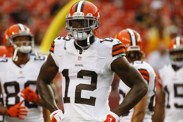 Cleveland Browns wide receiver Josh Gordon (12) warms up before an NFL preseason football game against the Washington Redskins on Monday, Aug. 18, 2014, in Landover, Md. (AP Photo/Evan Vucci)