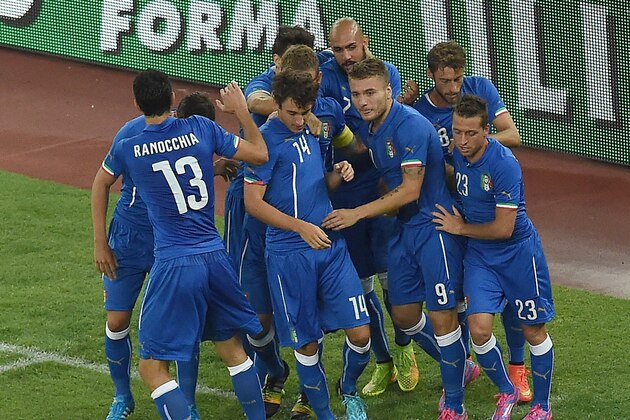 BARI, ITALY - SEPTEMBER 04:  Ciro Immobile of Italy celebrates with his teammates after scoring the opening goal during the international friendly match between Italy and Netherlands at Stadio San Nicola on September 4, 2014 in Bari, Italy.  (Photo by Giuseppe Bellini/Getty Images)