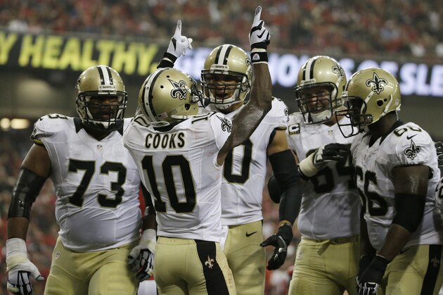 New Orleans Saints wide receiver Brandin Cooks (10) celebrates his touchdown against the Atlanta Falcons during the first half of an NFL football game, Sunday, Sept. 7, 2014, in Atlanta. (AP Photo/David Goldman)