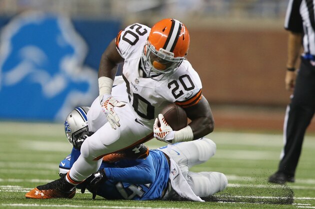 DETROIT, MI - AUGUST 09: Terrance West #20 of the Cleveland Browns tries to get out of the tackle by Isa Abdul-Quddus #42 of the Detroit Lions in the third quarter during a preseason game at Ford Field on August 9, 2014 in Detroit, Michigan. (Photo by Leon Halip/Getty Images) DETROIT, MI - AUGUST 09: Terrance West #20 of the Cleveland Browns tries to get out of the tackle by Isa Abdul-Quddus #42 of the Detroit Lions in the third quarter during a preseason game at Ford Field on August 9, 2014 in Detroit, Michigan. (Photo by Leon Halip/Getty Images)