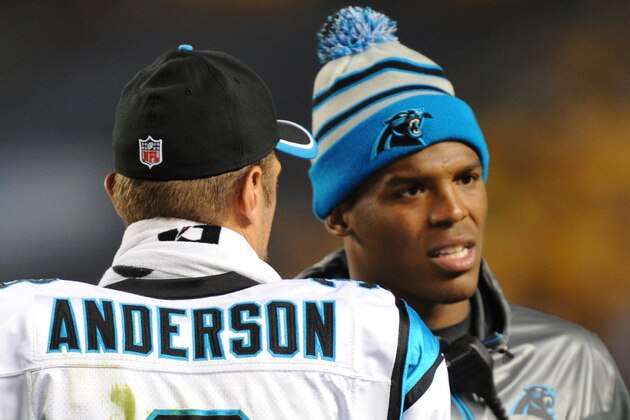 Carolina Panthers quarterback Cam Newton, right, talks with quarterback Derek Anderson (3) during the NFL preseason football game against the Pittsburgh Steelers on Thursday, Aug. 28, 2014 in Pittsburgh. (AP Photo/Don Wright)