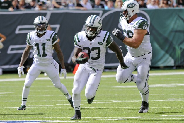 New York Jets running back Chris Ivory (33) rushes for a touchdown during the second half of an NFL football game against the Oakland Raiders Sunday, Sept. 7, 2014, in East Rutherford, N.J. (AP Photo/Bill Kostroun)