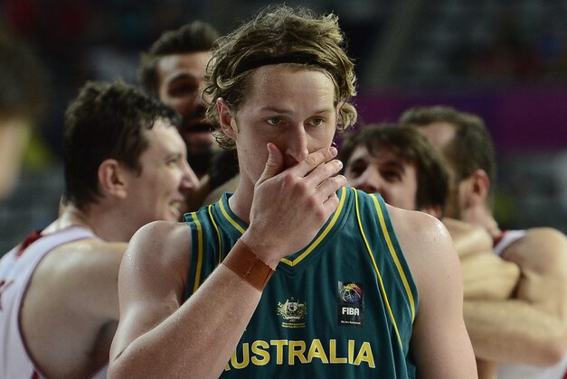 Australia's Cameron Bairstow, front, reacts at the end of the match after a Basketball World Cup Round of 16 match between Turkey and Australia at the Palau Sant Jordi in Barcelona, Spain, Sunday, Sept. 7, 2014. The 2014 Basketball World Cup competition will take place in various cities in Spain from Aug. 30 through to Sept. 14. (AP Photo/Manu Fernandez)