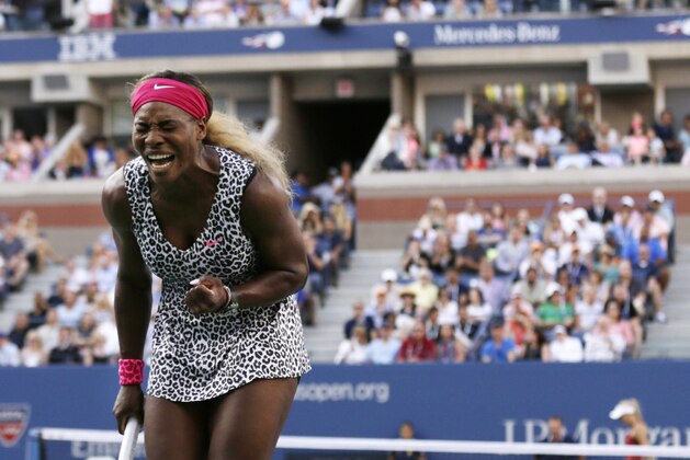Serena Williams, reacts after a shot against Caroline Wozniacki, of Denmark, during the championship match of the 2014 U.S. Open tennis tournament, Sunday, Sept. 7, 2014, in New York. (AP Photo/Charles Krupa)