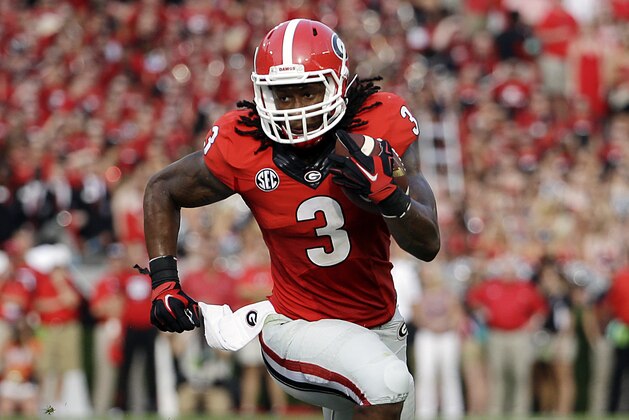 Georgia's Todd Gurley runs the ball in the first half of an NCAA college football game against Clemson, Saturday, Aug. 30, 2014, in Athens, Ga. (AP Photo/David Goldman)